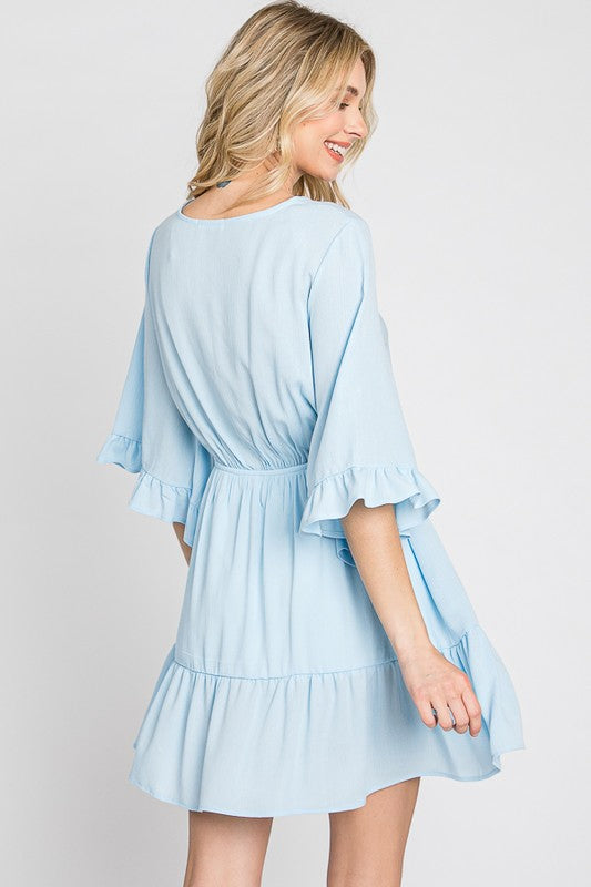 color: light blue. size: s,m,l. detail: asymmetrical neckline, ruffle bell sleeves, ruffle detail at the hem. wear it to the party, pinic , beach