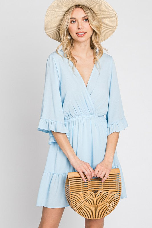 color: light blue. size: s,m,l. detail: asymmetrical neckline, ruffle bell sleeves, ruffle detail at the hem. wear it to the party, pinic , beach